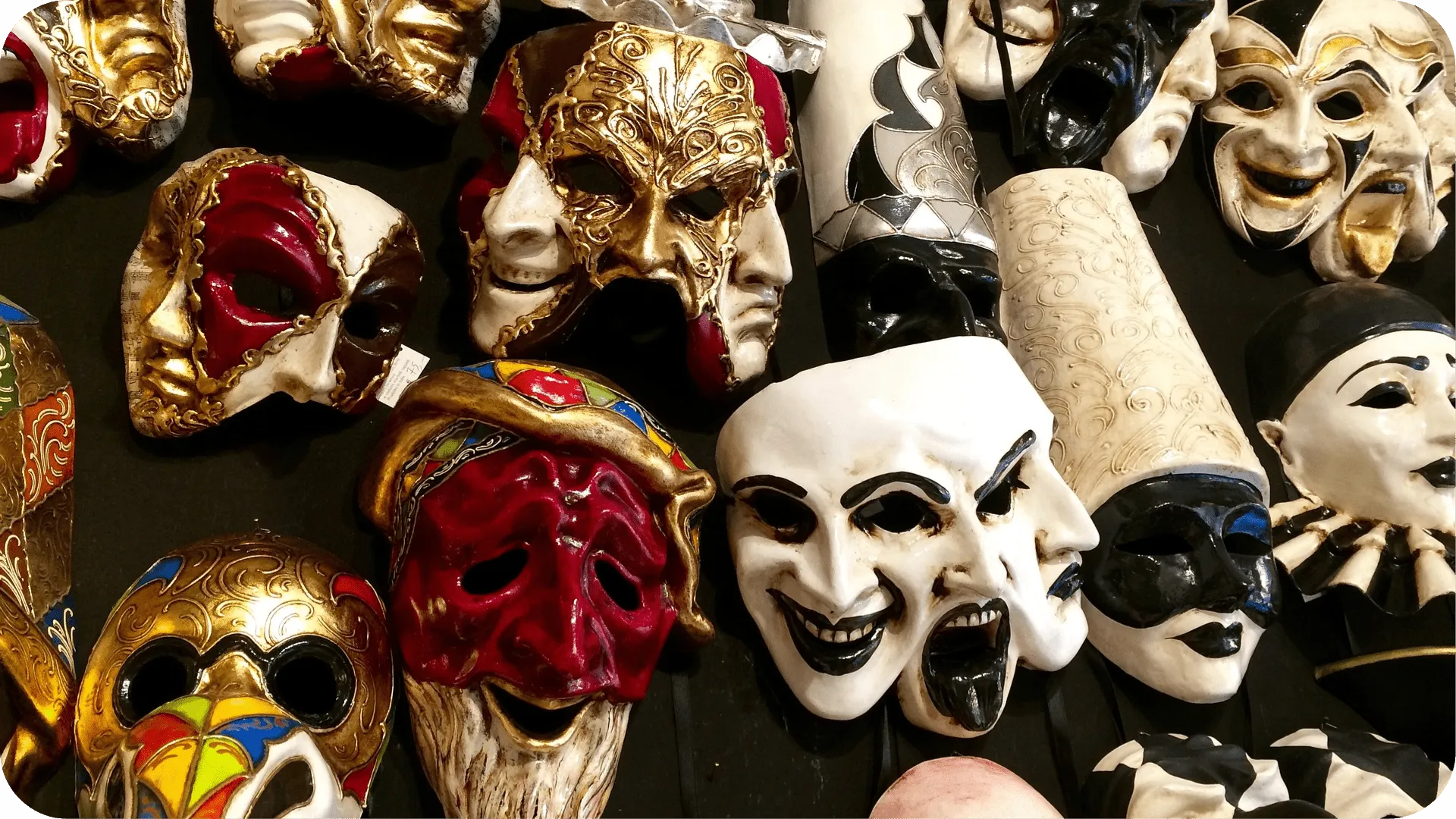 A wall of Venetian masks.